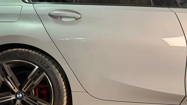 BMW – باب خلفي – إصلاح بدون دهان